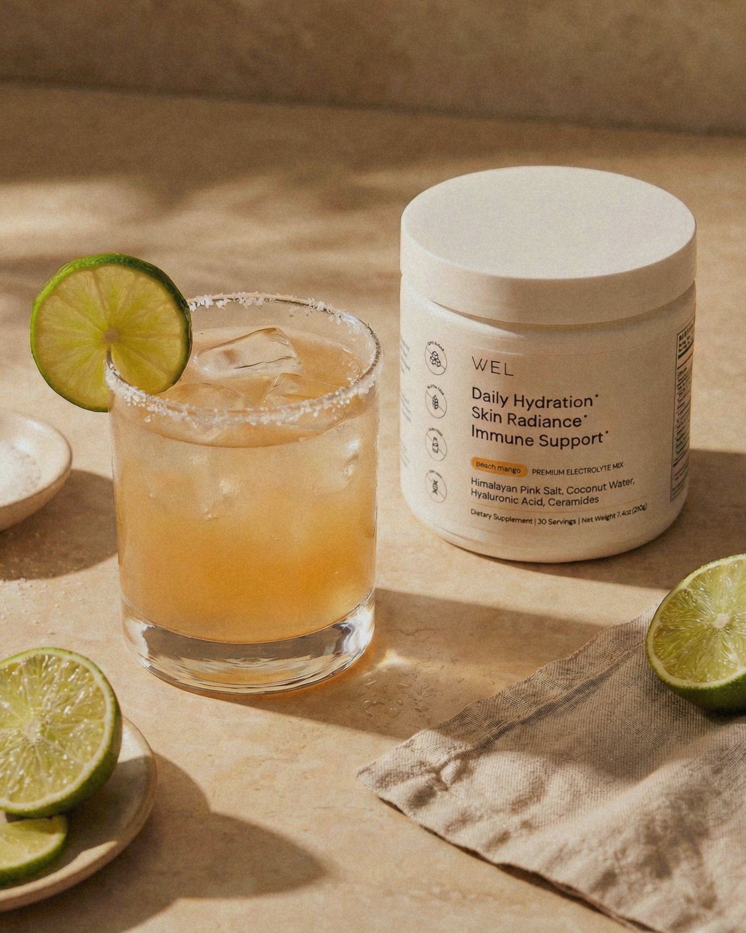 Glass of iced margarita drink made with WEL premium electrolytes.